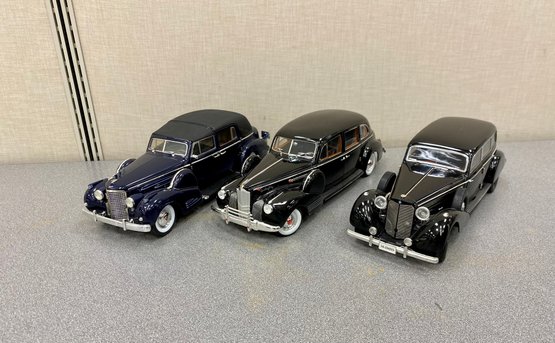 Three Model Cars Signature Diecast Collectible