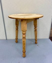 An Antique English Pine Cricket Table