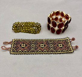 Trio Of Fun Bracelets - Deep Red Faceted Glass Stretch, Triple Strand Olive Faceted Glass, Woven Bead Cuff