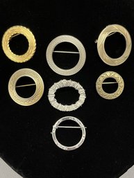 Lot Of 7 Round Textured Gold And Silver Tone Brooches - One Signed Gerry