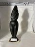 Carved Stone Statue On White Marble Base, 19' Tall