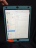 IPad 8th Generation, Software 14.2, M: A2428; 32GB, Screen Protector, Black/Blue Otter Box Case With Kick Stand; Cleaned To Original Factory Settings, Home Button, Battery Does Charge But No Charger Included