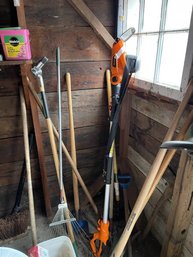 Lot Of Garden Tools Including: Pole Saw, Weed Wacker, Shovels, Rakes, Edger