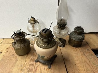 Lot Of 5 Kerosene Lamps, One Has Globe, 2 Brass Lamp Inserts, 1 China, 2 Clear Glass