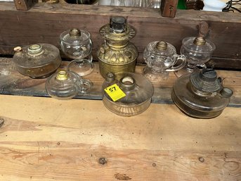 Lot Of 8 Kerosene Lamps, 1 Brass Insert And 7 Clear Font Lamps