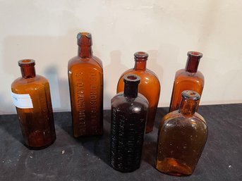 Lot Of (6) Brown Glass Bottles Including:  Boston, AL Murdock Liquid Food, Himalya, The  Kola Company, Etc.
