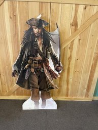 6' Tall Cardboard Cut Out Of Jack Sparrow, Center Fold Line, Worn At Corners, Bent Hat & Sword, Some Damage To Fingers