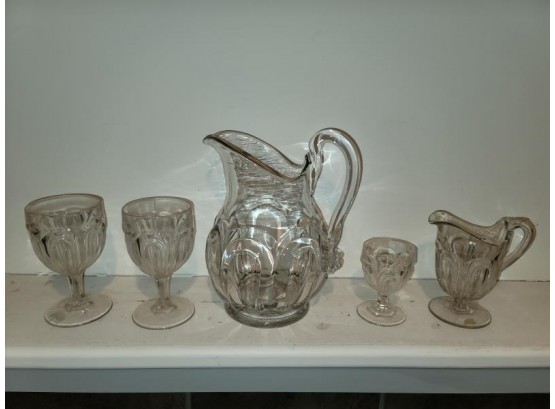 Lot Of 5 Glass Pieces, One Large 9.5' H Pitcher, One Cream Pitcher And 3 Goblets