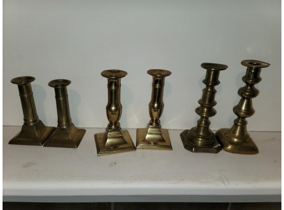 2 Pair Of Brass Candlesticks, Push Ups And 2 Odd Candlesticks (one Push Up Missing)