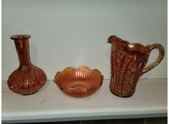 3 Pieces Of Carnival Glass, Vase, Pitcher And Bowl