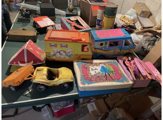 Collection Of Barbie Items Including (2) Bus, (1)Jeep, (2) Doll Case, (5) Dolls