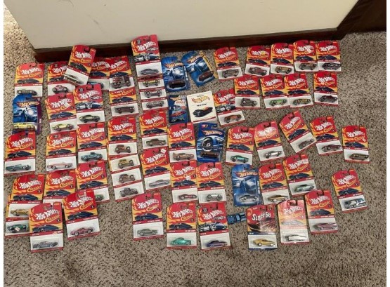 Hot Wheels Collection; Approx 60 Plus (2) Books; One Is 2004 Collectors Guide