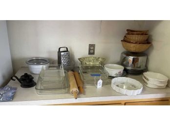 Lot Of Kitchen Ware Including, Rolling Pin, Glass Cookware, Graters, Basket, Misc
