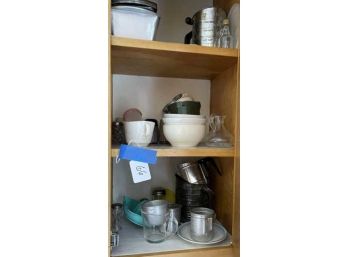 Contents Of Cabinet With Measuring Cups, Sifter, Glassware, Baking Ware, Misc