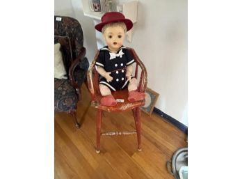 Red High Chair With Doll