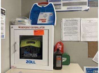 Zoll AED Plus Defibrillator With Cabinet, First Aid Kit
