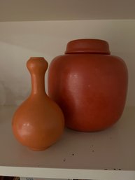 Pair Of Red/orange Ceramic Objects