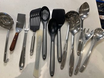 Collection Of Spatulas And Serving Items As Pictured