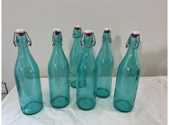 Set Of Six Blue Glass Bottles
