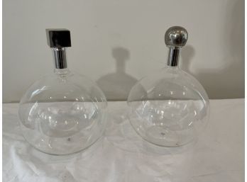 Pair Of Glass Globe Like Lidded Decanters