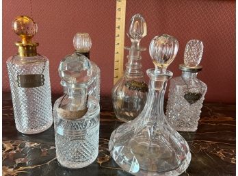 Six Vintage Crystal Decanters