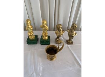 Collection Of Figures And Cup