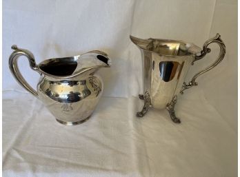 Pair Of Silver Plated Pitchers