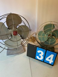 Lot 34 - Two General Electric Fans