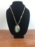 Vintage Turquoise Necklace With Large Ornate Pendant With Feather Accent