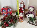 Collection Of Christmas Decorations Featuring Hand Carved Wooden Santa