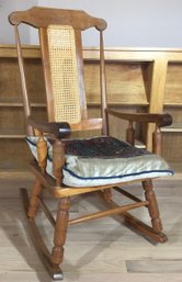 Antique Rocker With Caned Back Panel