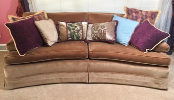 Well-kept Vintage Semi Rounded Couch With Beautiful Variety Of Throw Pillows With Lift Block