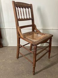 Brown Wooden Chair With Caning Seat