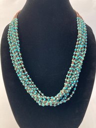 Multi Strand Turquoise & Mini Shell Rondelles With Sterling Stamped Cone Clasp