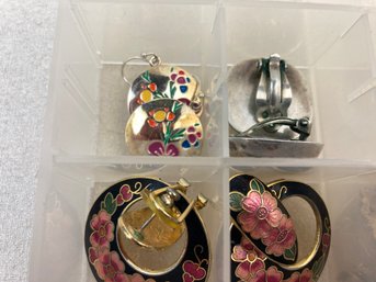 Plastic Organizer With Collection Of Various Earrings