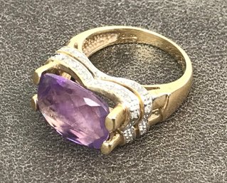 10K Ring With Diamond Chips & Facetted Purple Stone