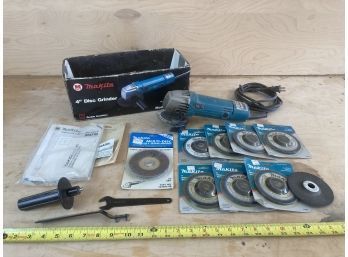Makita Brand 4 Inch Disc Grinder With Big Assortment Of Grinding Wheels In Original Box