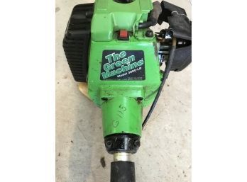 The Green Machine Model 3000-LP Weed Eater With Silver Colored Arm