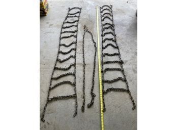 Set Of Tire Chains Approximately 7 Feet Long, Appear To Be In Good Condition