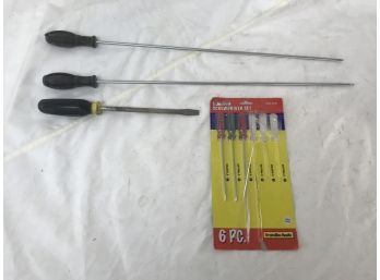 Extra Long Phillips And Regular Screwdrivers, Regular Screwdriver, And Three Small Screwdrivers