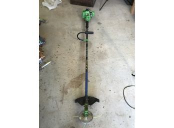 The Green Machine Model 3000 M Weed Wacker With Blue Arm