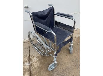 Wheelchair (Rolls But Had Been Stored Outside)