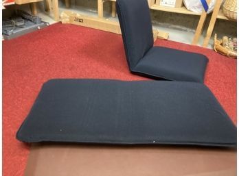 2 Navy Cushioned Articulating Seats And A Brown Anti-fatigue Mat