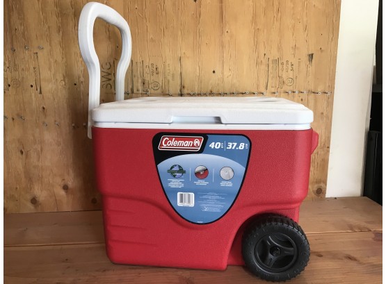 Handy Big Coleman Red Cooler With Handle, Rolling Wheels, & Beverage Holders