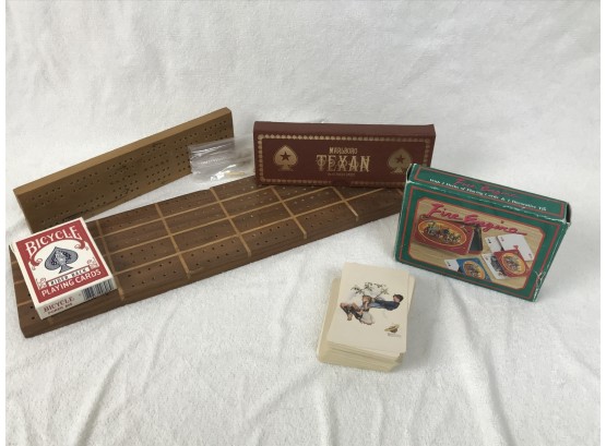 Assortment Of Cribbage Boards & Playing Cards Featuring Norman Rockwell Cards