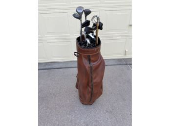 Vintage Brown Golf Bag With Assortment Of Clubs