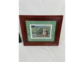 Two Small Framed Pictures