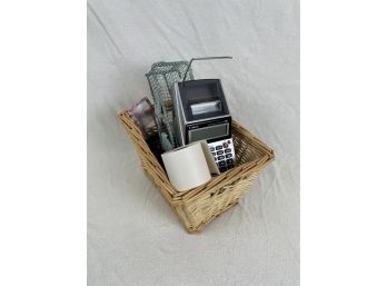 Assortment Of Desk Items Featuring Adding Machine With Paper Roll