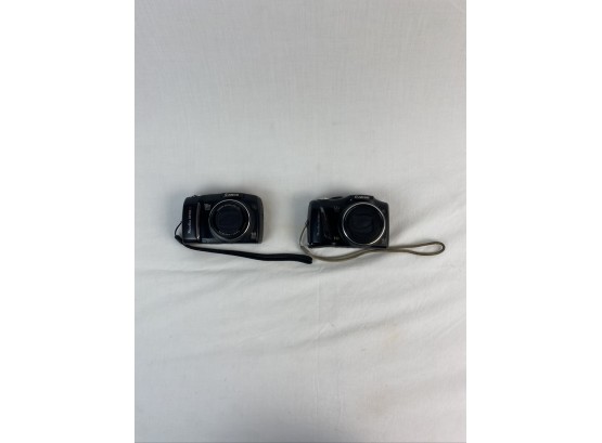 Pair Of Canon Digital Cameras- (see Photos- Electronics Are Not Tested)