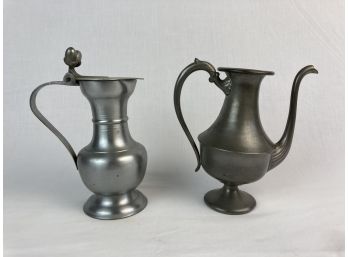 Two Metal Antique Pitchers One Believed To Be Pewter And The Other Believe To Be Zinc